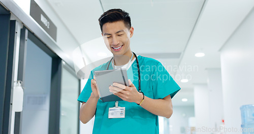 Image of Doctor, nurse and smile on tablet for hospital services, thinking of healthcare and typing information online. Medical worker or Asian man in China with digital technology, clinic inspection or ideas