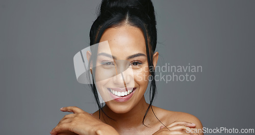 Image of Face, skincare and beauty of woman in studio isolated on a gray background mockup space. Portrait, natural and serious model in spa facial treatment for aesthetic, cosmetic and wellness for health