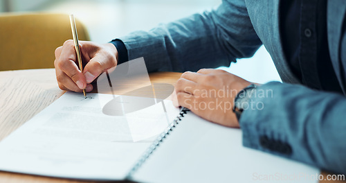 Image of Lawyer hands, documents and signature for legal contract, agreement or terms and conditions in office. Business person, notary or attorney writing information, reading print and policy at law firm