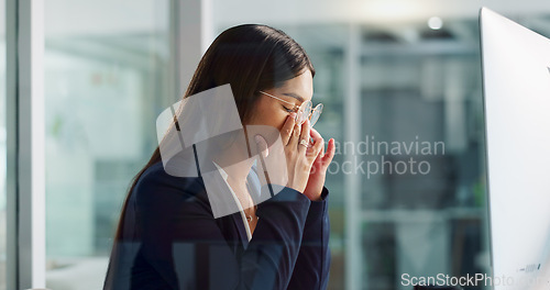 Image of Business woman, headache and tired on computer for copywriting deadline, online planning and office stress. Young worker, editor or writer with eye strain, glasses and pain on desktop for research