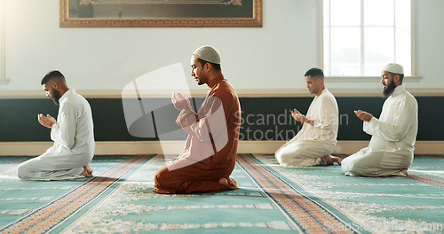 Image of Islamic, praying and holy men in a Mosque for spiritual religion together as a group to worship Allah in Ramadan. Muslim, Arabic and people with peace or respect for gratitude, trust and hope