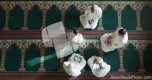 Image of Islamic prayer, worship and men in mosque with child, mindfulness and gratitude in faith from above. Love, religion and Muslim people together in holy temple for praise, spiritual teaching and peace.