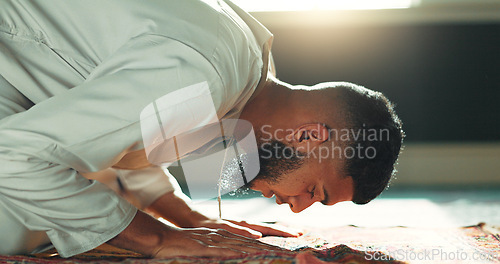 Image of Islamic prayer man on mat in mosque with mindfulness, love and gratitude in faith commitment. Worship, religion and Muslim person in holy temple for praise, spiritual teaching and meditation peace.