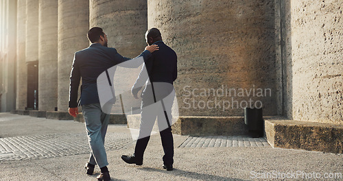 Image of City, talking and walking with business men outdoor together on morning commute to corporate job. Collaboration, travel or conversation with mentor and employee on sidewalk or street of urban town