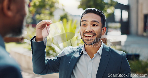 Image of Business people, laughing and talking outdoor in city with morning commute, partnership and travel. Employees, workers and chat with conversation, collaboration and happy for networking in urban town