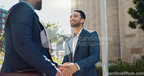 Image of Business men, friends and handshake in city for greeting, hello and meeting with respect, smile and welcome. People, professional staff and happy for shaking hands, deal or agreement for networking