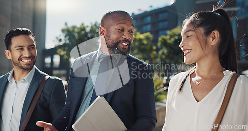 Image of Business people, travel and group in city with discussion on morning commute, partnership and walking. Employees, man and woman with conversation, collaboration and networking outdoor in urban town