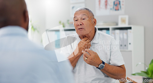 Image of Senior, man and consulting doctor on chest pain, sore or discomfort in healthcare hospital. Mature, male person or patient talking to medical employee for heart ache, breathing or illness at clinic