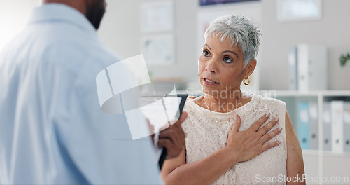 Image of Patient, doctor and chest pain for consultation advice with clipboard for checklist or inflammation, Indigestion or infection. Female person, wellness and retirement or lung illness, healing or help