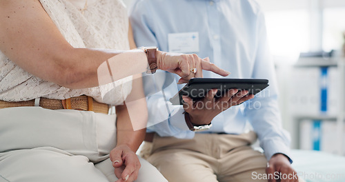 Image of Hands, doctor and patient with tablet in clinic for results, insurance and scroll for healthcare. People, medic and digital touchscreen with click consultation, counselling or chat in hospital office