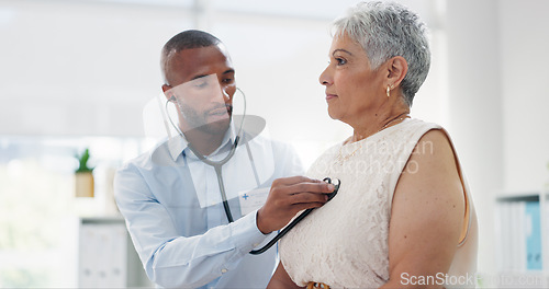 Image of Stethoscope, examination and doctor with senior woman at hospital for lungs, chest or breathing assessment. Heart, listen and elderly patient consulting cardiologist for heartbeat, pulse or checkup
