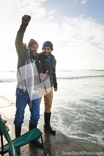 Image of Happy, surprise and people with fish at water with pride for catch of tuna on pier at sunset. Fishing, friends and fisherman smile with shock at success in nature at sea on holiday or vacation