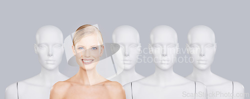 Image of Woman, mannequins and smile for identity, beauty and individuality on studio background. Person, skincare and dummy with face for creativity and cosmetics or unique ideas for satisfaction and skin