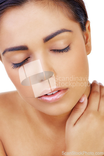 Image of Skincare, face and woman in studio with natural, glow and healthy routine for wellness. Beauty, cosmetic and closeup of young female person with facial dermatology treatment by white background.