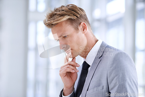 Image of Businessman, thinking and planning in office, pondering and professional in workplace with ideas. Male person, employee and contemplating career choice or decision, entrepreneur and brainstorming