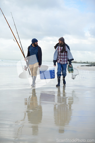 Image of Fisherman, friends and walking on beach for fishing in the morning by sea with happiness, equipment or sky. Friendship, men and net with bonding, travel or rod by water for hobby, holiday or activity