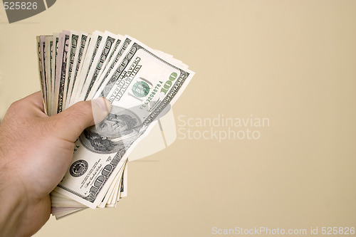 Image of Handful of Money