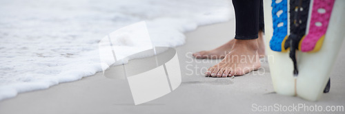 Image of Feet, shore and surfer on beach for sports, athlete and board for outdoor adventure or ocean waves. Person, legs and closeup of nature for fitness, sea and traveling to water on holiday or vacation