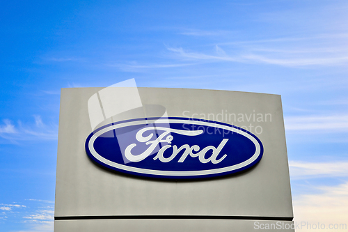 Image of Ford Motor Company Logo Against Blue Sky