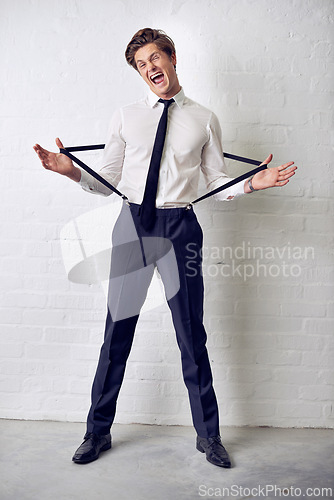 Image of Man, funny and fashion with crazy, confidence and suit with trendy and stylish clothes. Hipster, male person and wall with event, classic and fancy suspenders with dressing formal and funny joke