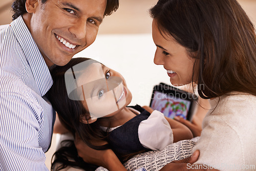 Image of Happy family, portrait and tablet with games for bonding, entertainment or enjoying weekend at home. Mother, father and daughter on technology for holiday, online app or interaction together at house