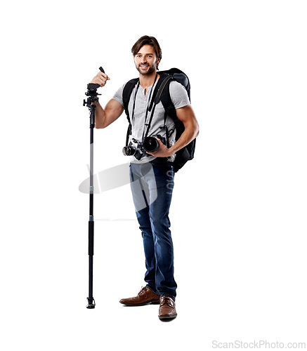 Image of Photographer, backpack and smile with camera in studio for career, behind the scenes and equipment. Photography, person and happy with lighting, confidence and shooting gear for photoshoot or passion