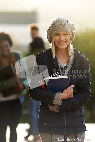 Image of Student, happy woman and portrait with books on campus, education and learning material for studying. Scholarship, smile at university for academic growth, textbook or notebook with knowledge outdoor