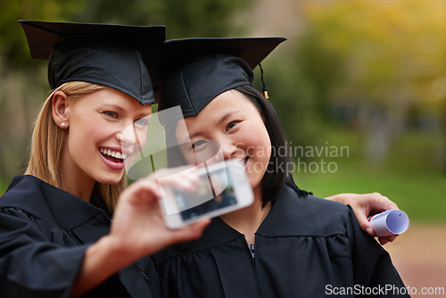 Image of Selfie, graduation and achievement with student friends on campus together for success at university. Education, certificate and photograph with happy graduate women at college event for scholarship