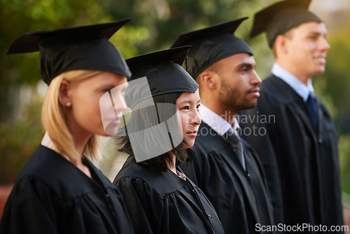 Image of Face, graduation and woman student in line with friends at outdoor ceremony for college or university. Education, scholarship or achievement with graduate men and women at academic school event