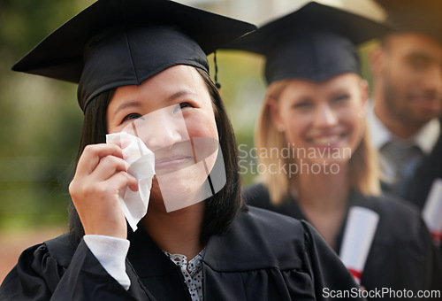 Image of Students, graduation and woman with crying, achievement and happiness with success or ceremony. Tissue, tears or excited with people or friends with diploma or celebration with degree or university