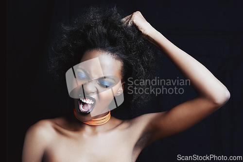 Image of Beauty, hair and frustrated black woman on dark background for hairstyle, texture and natural afro. Haircare, salon crisis and angry African person with cosmetics, accessories and makeup in studio