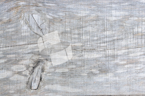 Image of Close-up detail of weathered wooden plank texture in natural lig