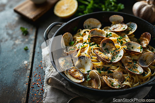 Image of Delicious Clam Linguine in a Cast Iron Skillet