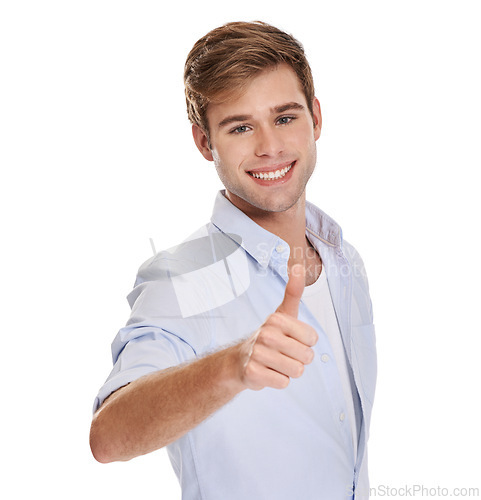 Image of Man, portrait and thumbs up for approval or agreement in studio, satisfaction and happy for yes. Male person, smile and like emoji for feedback or review on white background, promotion and support