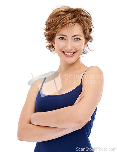 Image of Happy woman, portrait and confidence with beauty makeup, cosmetics or haircare on a white studio background. Face of confident or young female person or model with smile and arms crossed for style