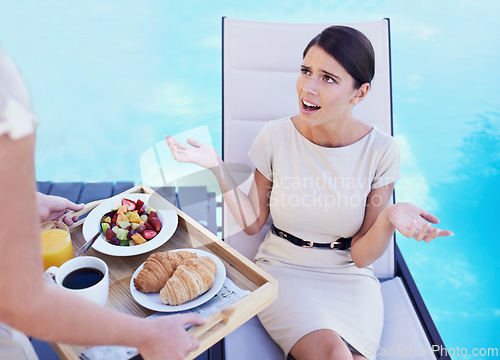 Image of Woman, customer and angry with food service, upset and conversation with complain and nutrition. Client, swimming pool and lady frustrated with meal or hospitality industry with wrong order or review