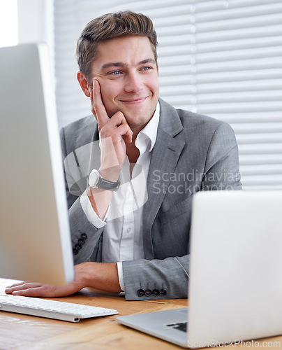 Image of Employee, laptop and computer with office, workspace and technology for work. Businessman, corporate and desktop for accounting, business and research with productivity for planning or portfolio