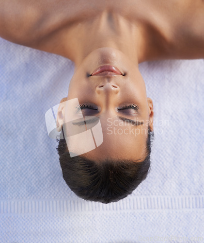 Image of Face of woman, top view or ready for luxury spa treatment, facial skincare or beauty for wellness. Towel, healing therapy or zen female client on bed to start massage, detox or chemical peel to relax