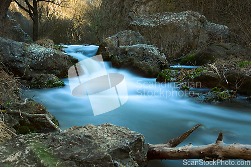 Image of blue mountain stream in Tureni gorges