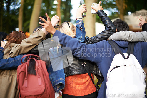 Image of Backpack, outdoor and hug with friends, music festival or excited with happiness or nature. Park, rear view or people with fun or event with party on holiday or vacation with getaway trip or cheering