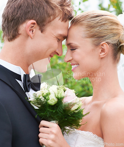 Image of Couple, man and woman in closeup on wedding in love, happiness and affection in relationship with romance and joy. Newlyweds, groom and bride in ceremony with flower, excited and beautiful.