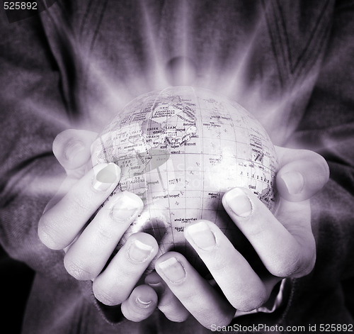 Image of Globe in a girl's hands