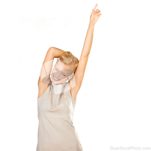 Image of Happy, dance and woman winning in studio for celebration, success and achievement or freedom. Young winner, person or model with energy, excited and yes for news or announcement on a white background