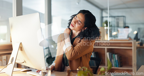 Image of Woman, neck and hand is sore, office and ache or cramp, laptop and business or pain. Businesswoman, injury and entrepreneur of startup, massage and arthritis or frustrated, fatigue and workplace