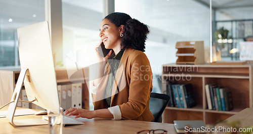 Image of Woman, computer and phone call as receptionist for client consulting or online booking, information with smile. Female worker, communication or talking in office for service, helping or appointment