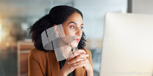 Image of Businesswoman at computer with stress, thinking and reading email, debt review or article on taxes at digital agency. Internet, research and woman at tech startup, anxiety and risk in audit report.