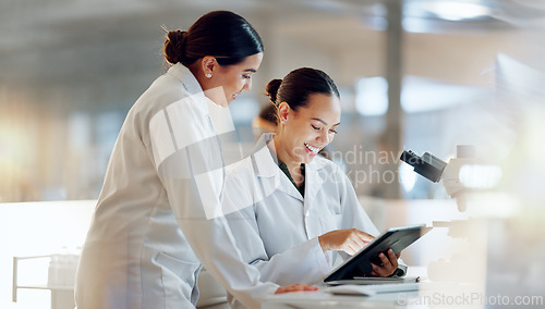 Image of Scientist, women and teamwork on tablet and computer for laboratory advice, medical research and night planning. Students, science people or mentor on digital technology of test results or comparison