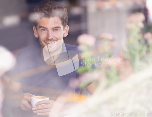 Image of Man, portrait and drinking tea in coffee shop, window and hot beverage for inspiration in cafe. Happy male person, smile and relaxing in restaurant with espresso, smiling and comfortable on weekend