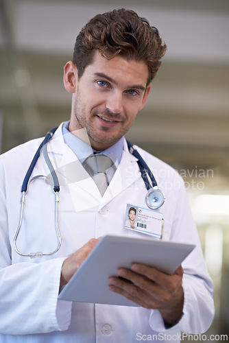 Image of Smile, tablet and portrait of doctor in hospital for medical research on the internet for diagnosis. Happy, professional and male healthcare worker with telehealth on digital technology in clinic.