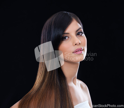 Image of Hair care, wellness and portrait of woman in studio with salon, healthy or conditioner treatment. Beauty, confident and female person with long, shiny and cosmetic hairstyle by dark black background.